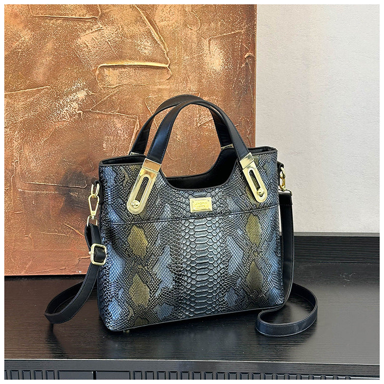 Snake pattern shoulder handbag