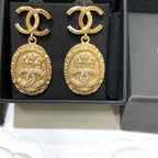 Vintage gold coin relief palace earrings