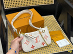 Fashion four-leaf clover letter printed messenger bag