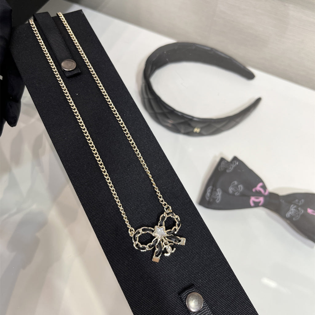 CC Fashion Rhinestone Bow Pendant Necklace