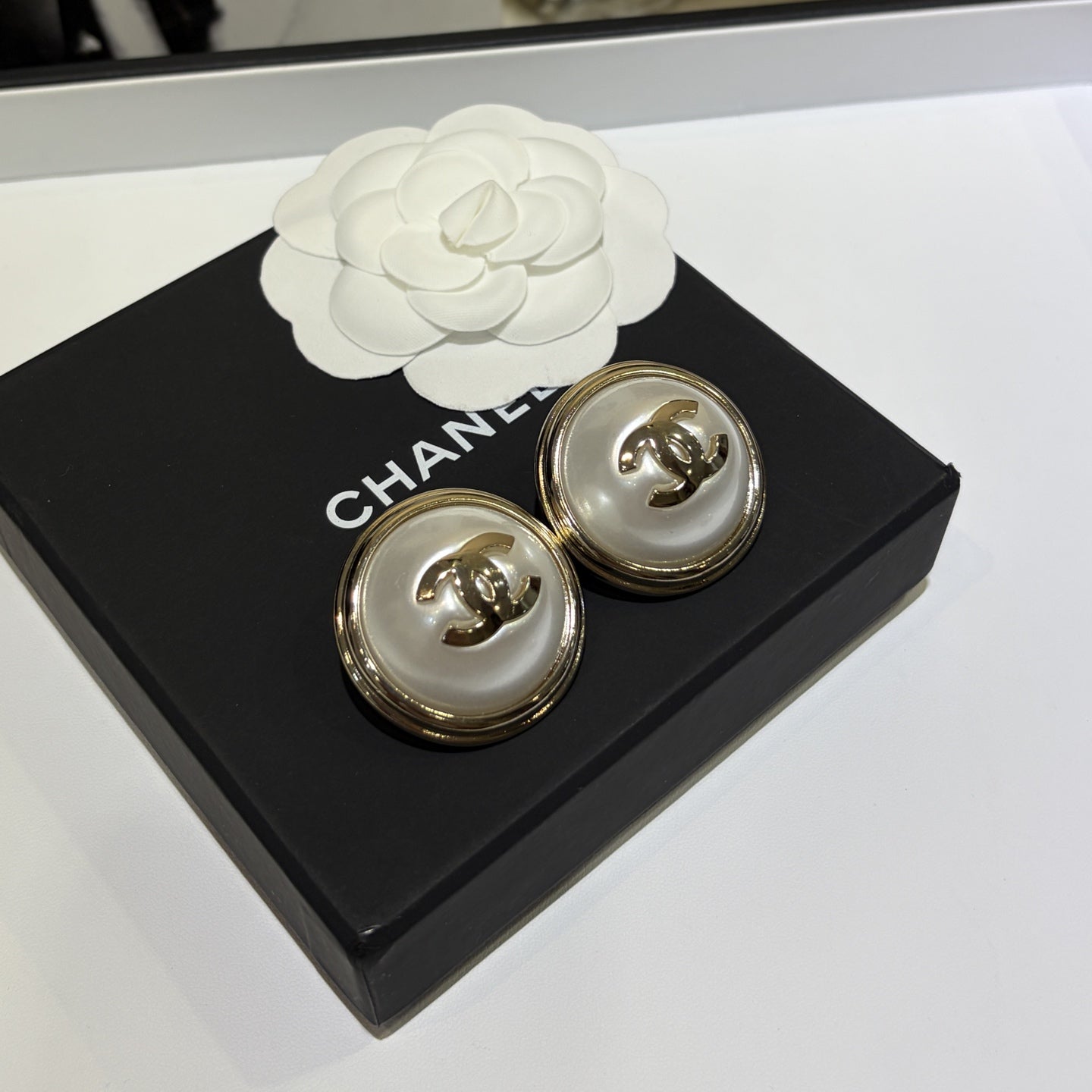 Stylish Round Pearl CC Earrings